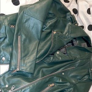 Green leather coat with zippers never been worn